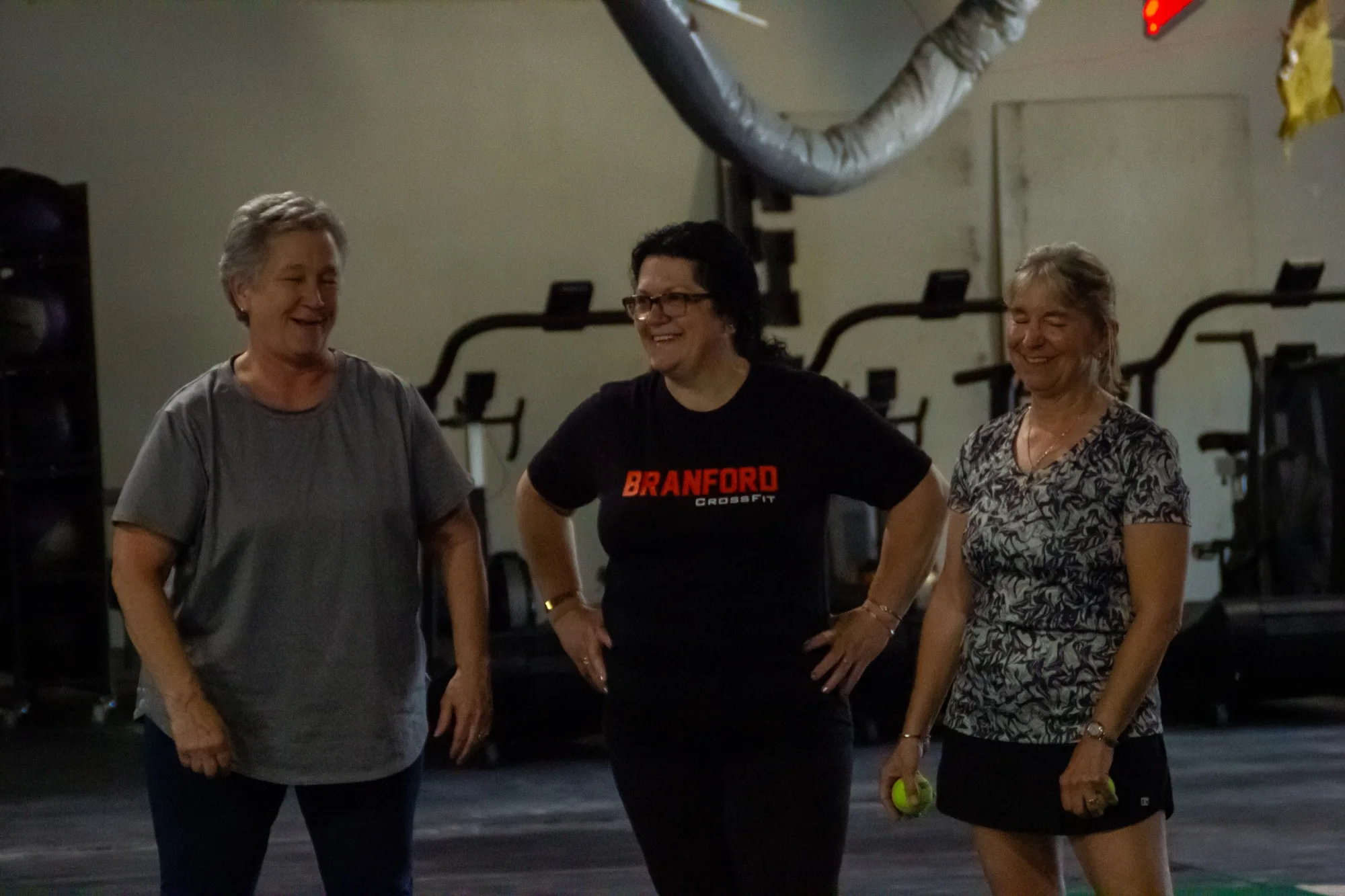 PLUS class members share a laugh between exercises at Top Form Physical Therapy in Branford, Connecticut